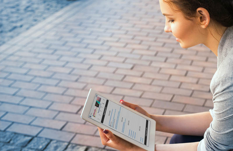 woman using app on ipad